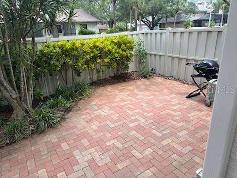 Bonus paver patio in Backyard space is perfect for grilling or hot tub/spa