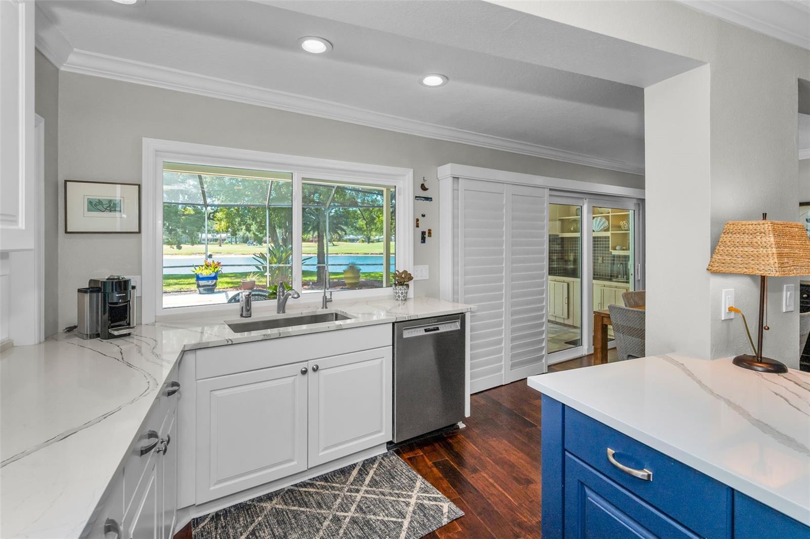 Kitchen with large stainless sink and Bosch dishwasher