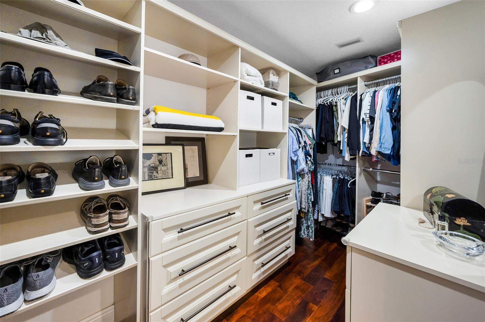 Primary custom closet with deep drawers