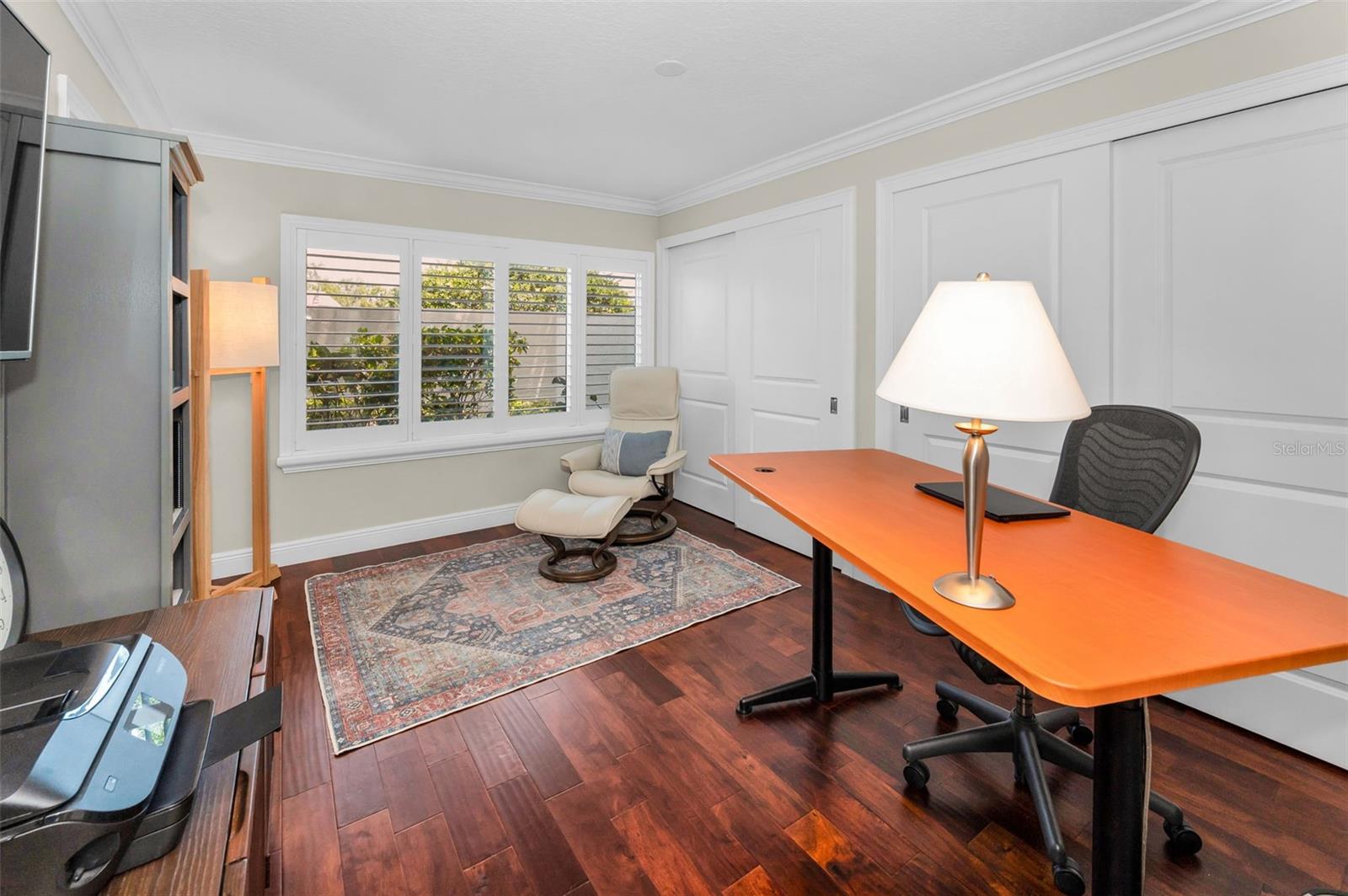 Office with two closets and pocket-door to powder room