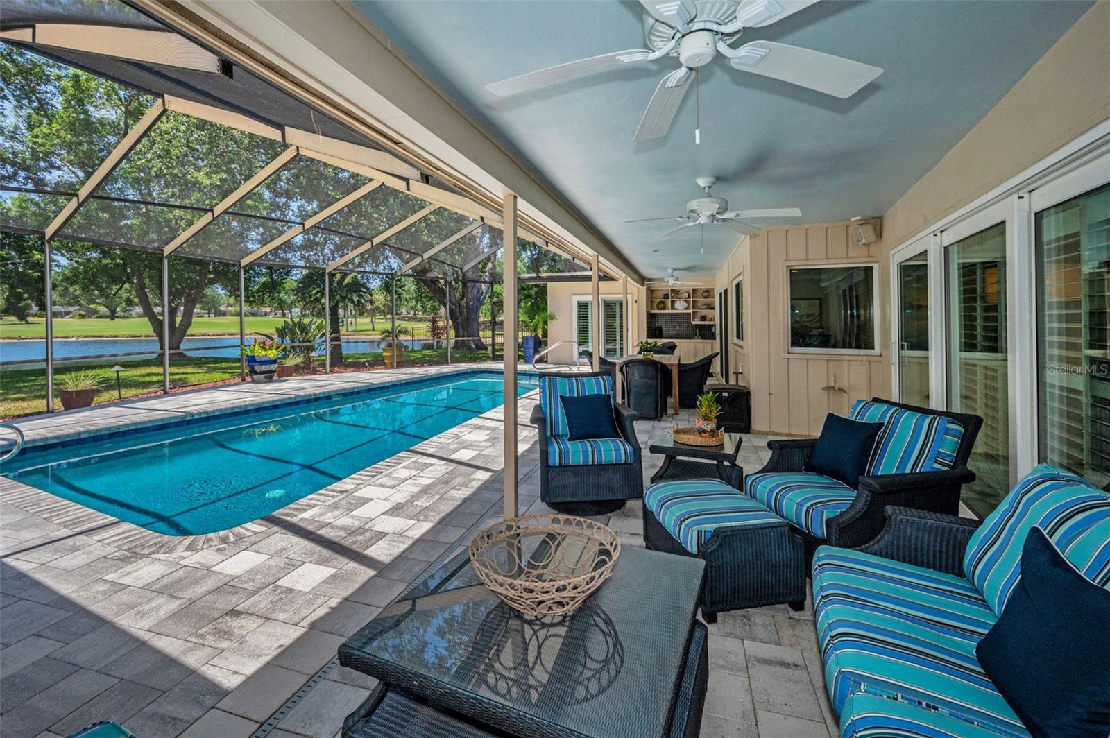 Covered seating area pavered lanai
