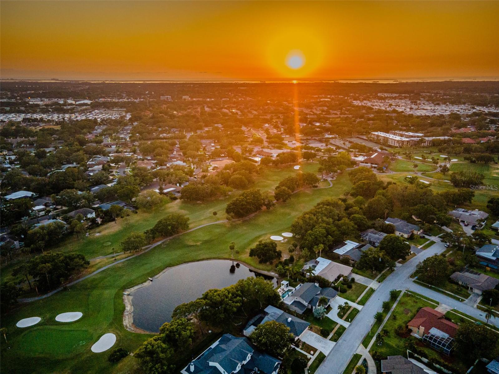 Aerial view of neighborhood and golf course