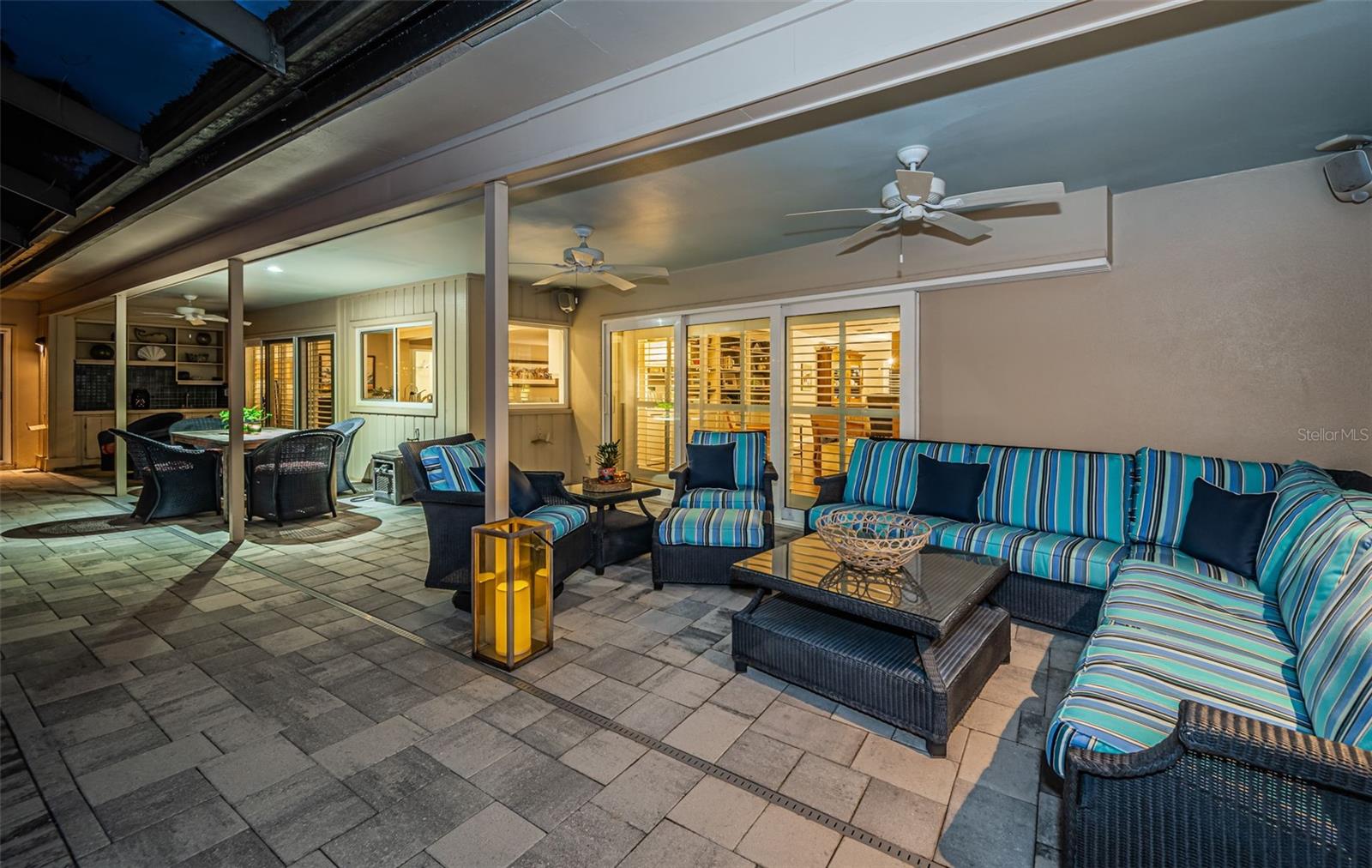 Large lanai with separate seating areas for entertaining!