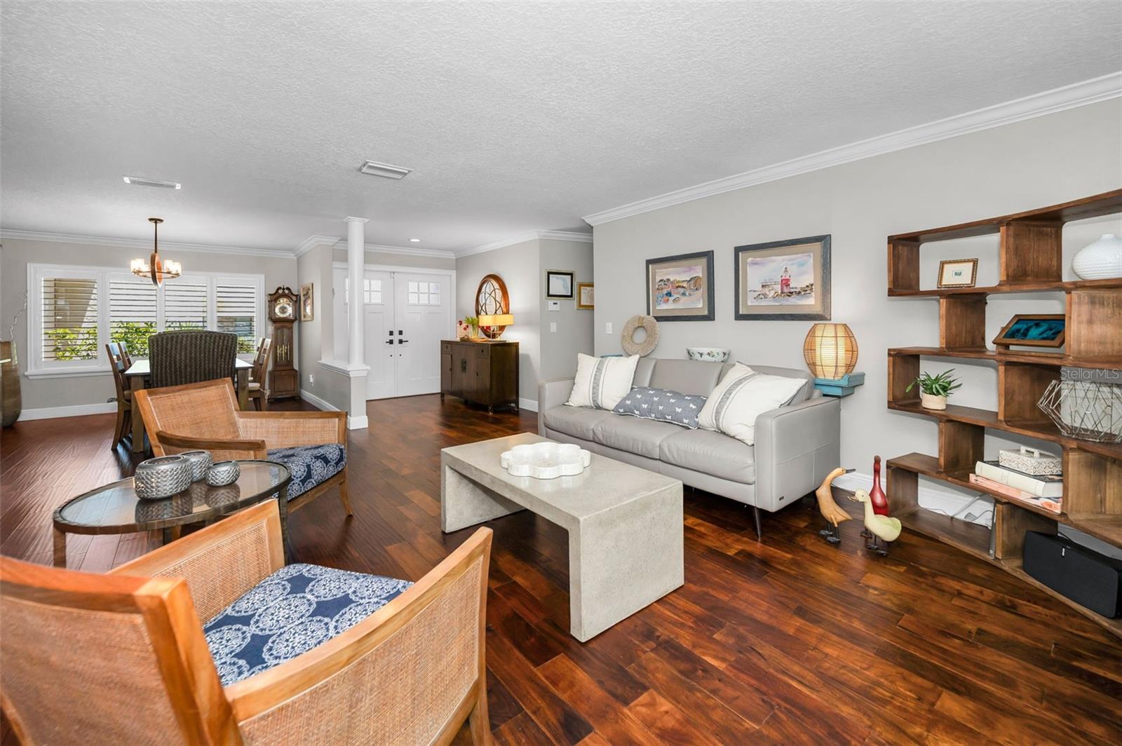 View toward foyer, engineered wood floors throughout most living spaces