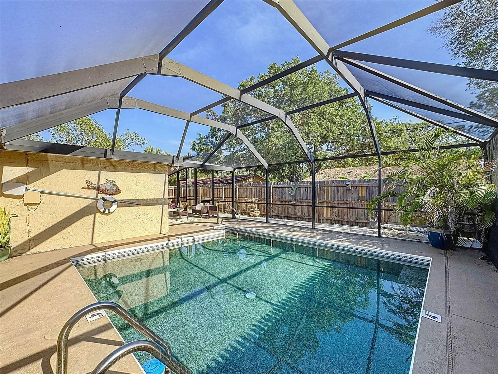A STUNNING 16 X 16 IN GROUND POOL.