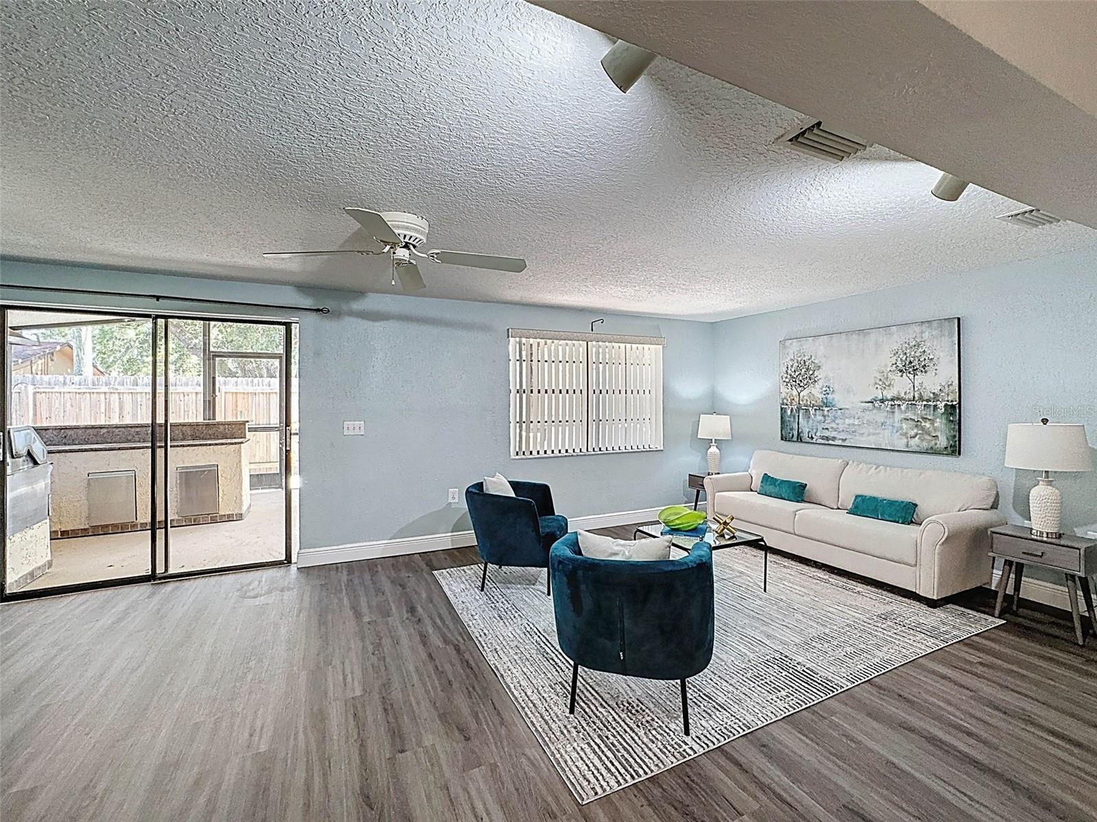 THIS SPACE IS LOCATED ON THE BACK OF THE HOUSE