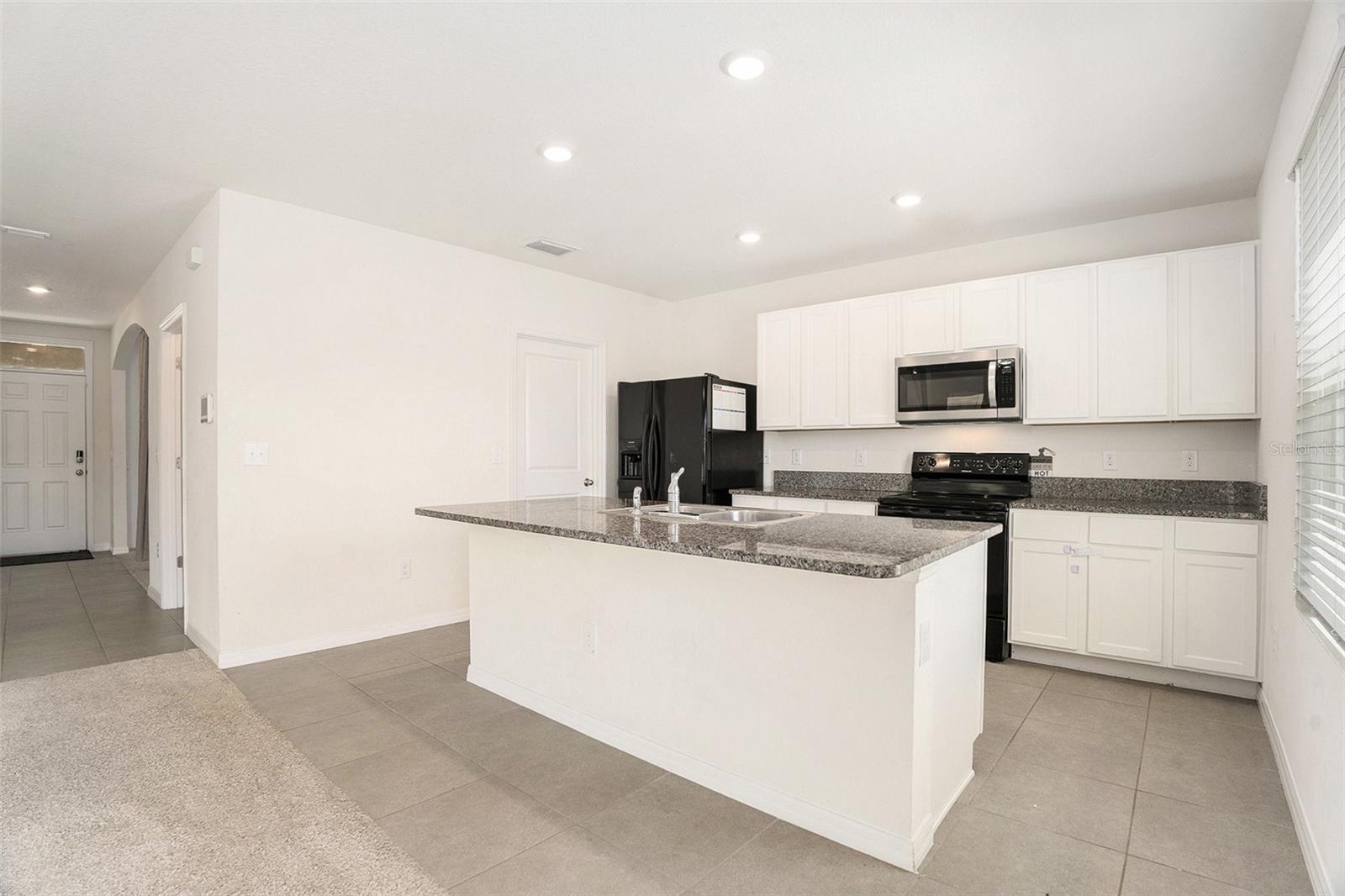 View of kitchen from living room