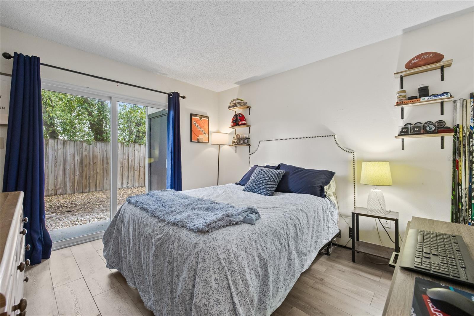 Bedroom with Sliding Doors and Walk in Closet