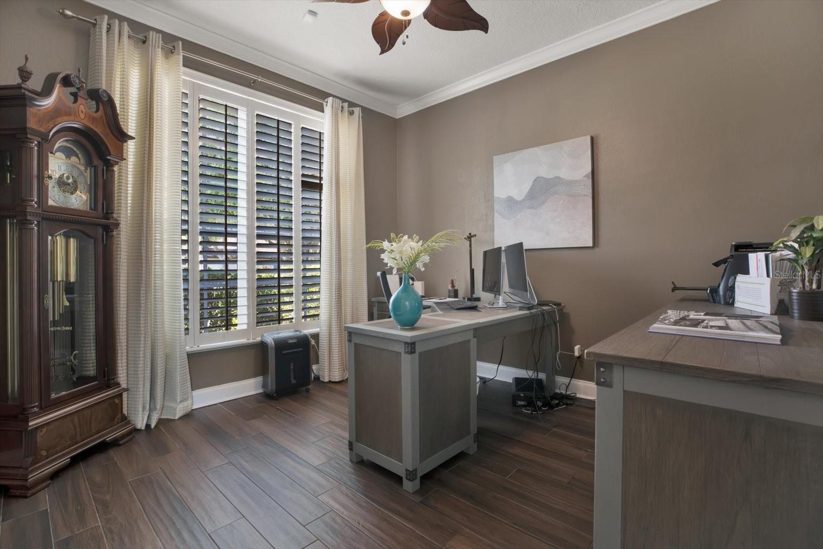 Private office to the left of entry on main floor with large closet/storage area.