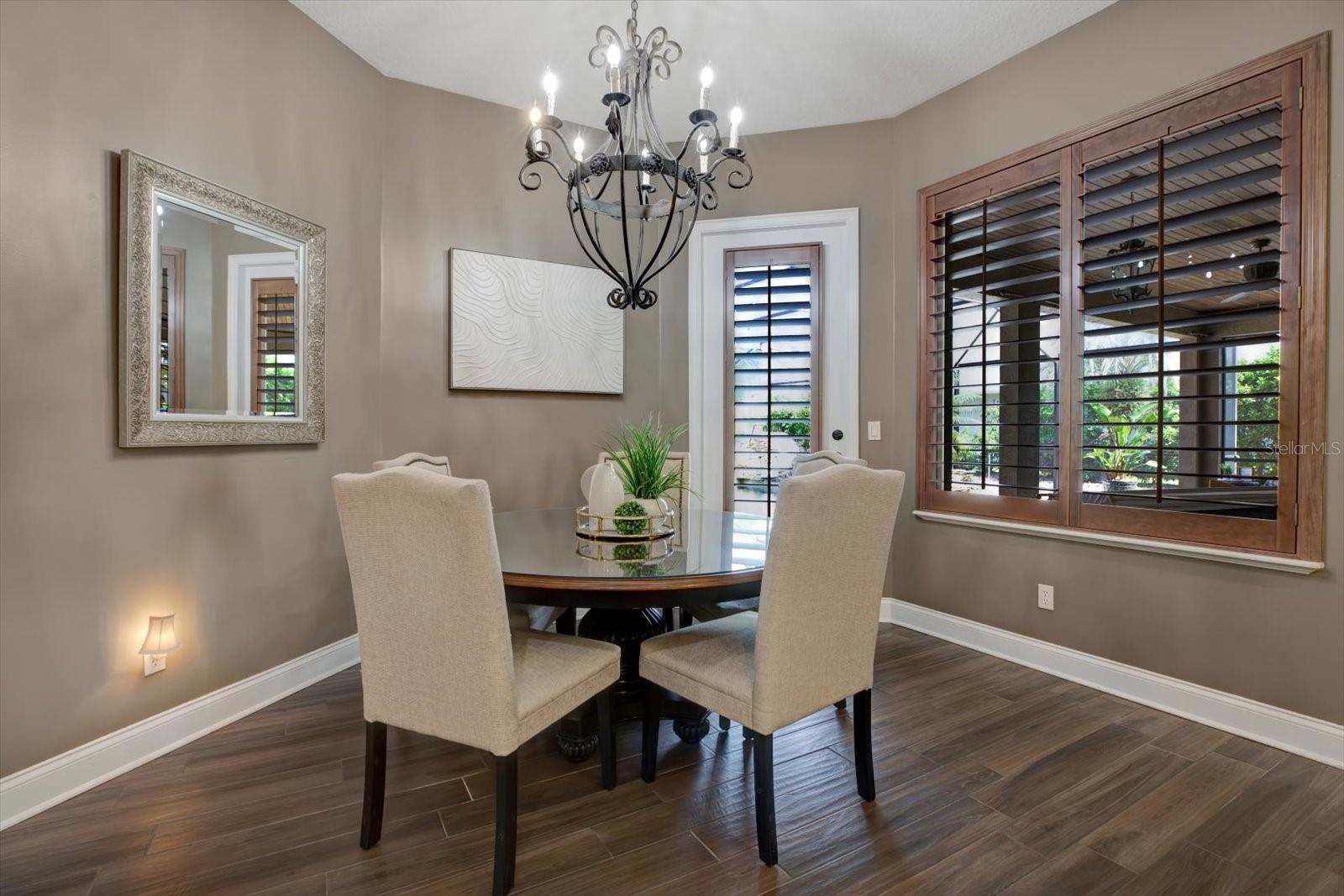 Breakfast nook leading to beautiful expansive lanai.