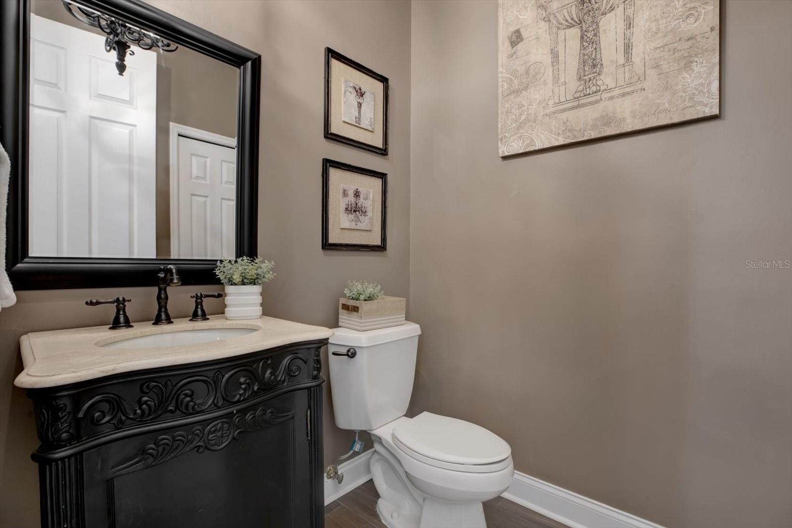 Convenient downstairs guest bathroom just off breakfast nook/family room.