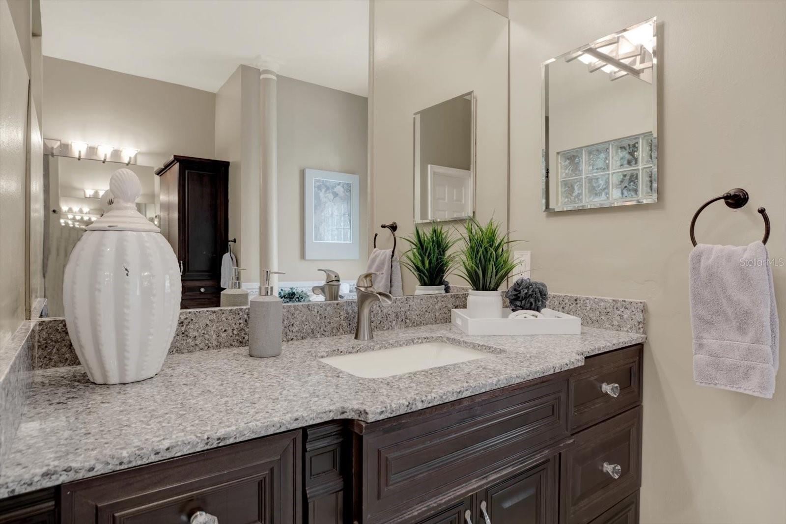 2 separate vanity and sinks with ample storage.