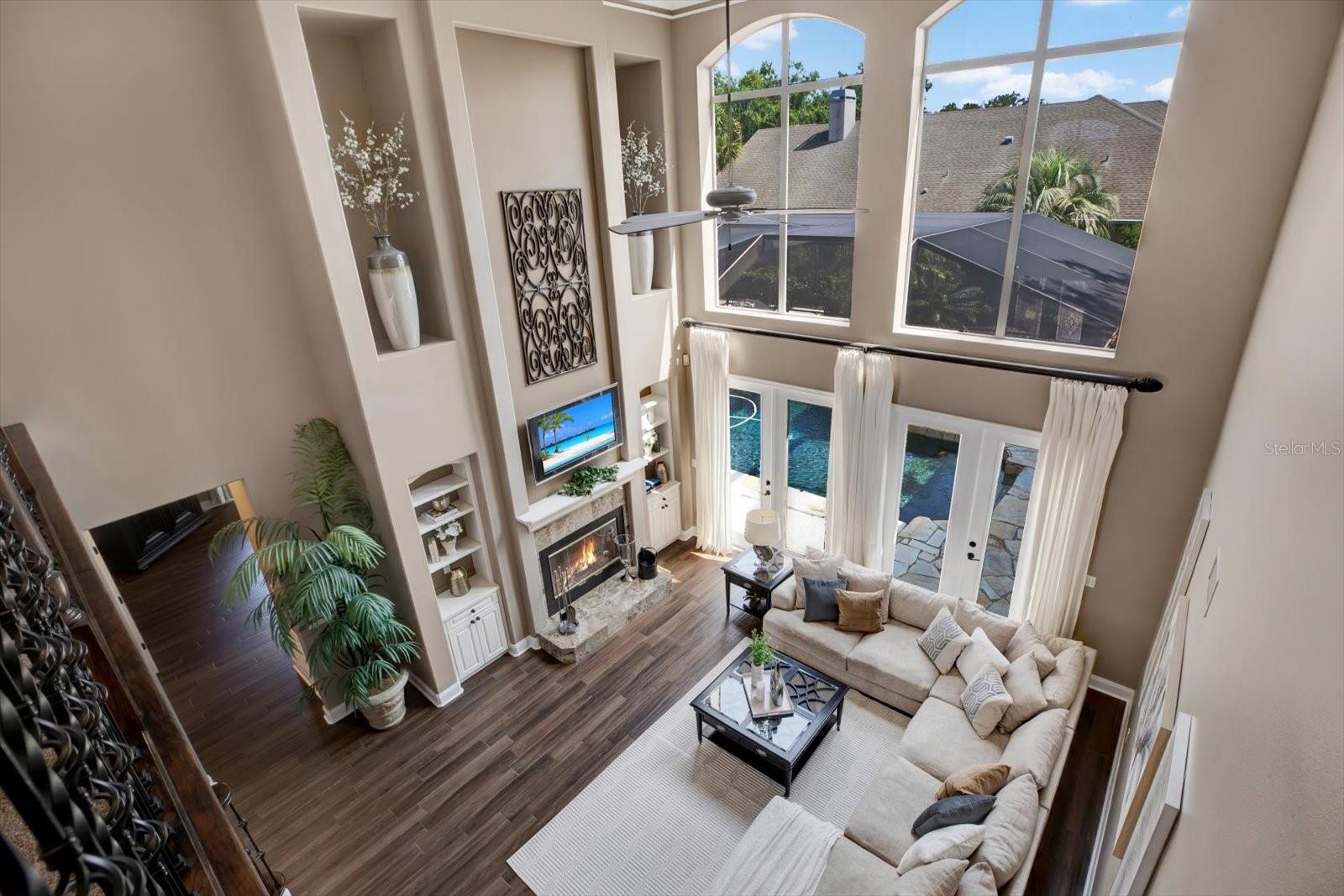 Open view from second level loft area landing with beautiful natural light.