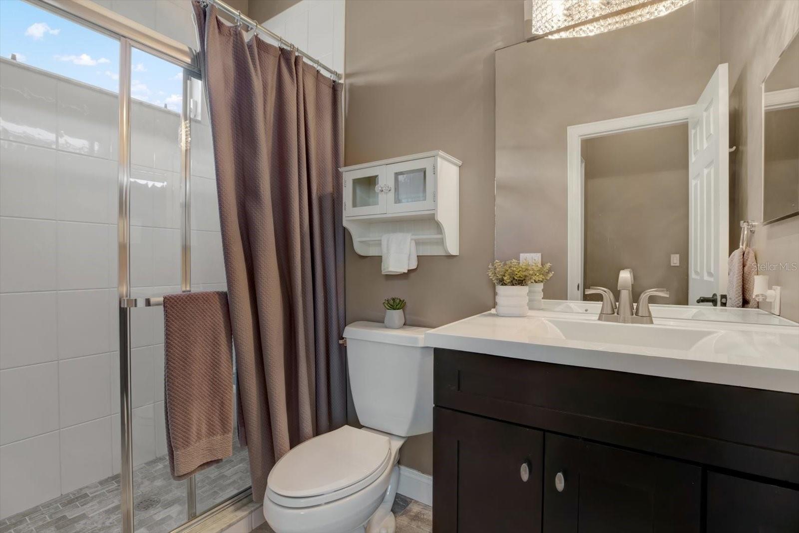 Private ensuite for bedroom 1 with walk in shower.