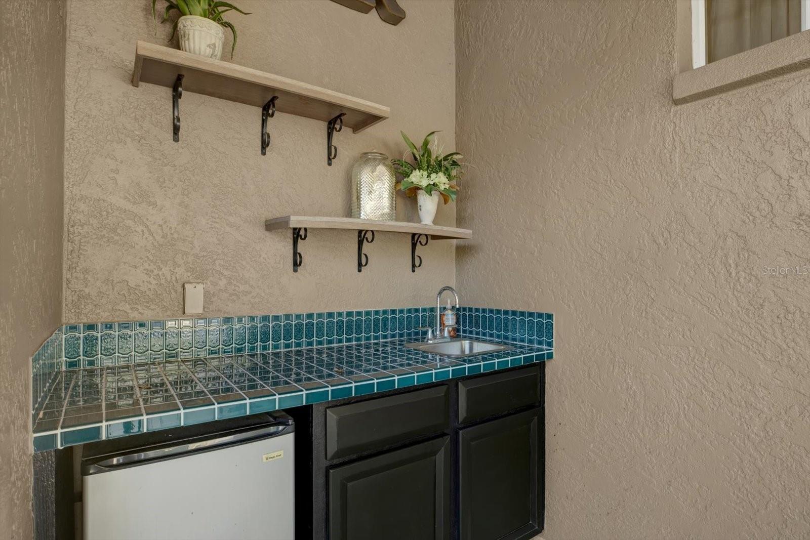 Wet bar and storage closet.