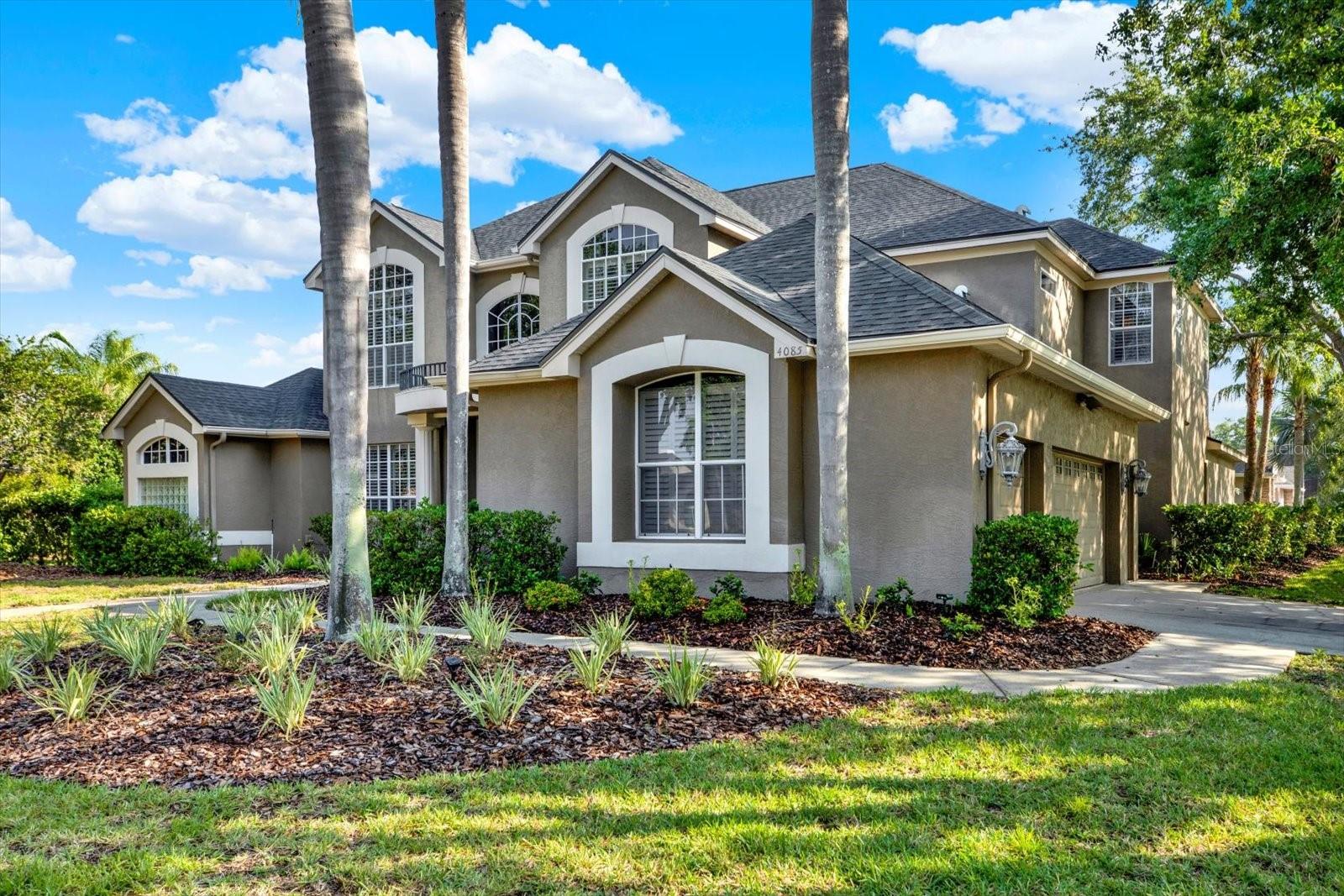 3 car garage with built in overhead storage and additional side door entry.