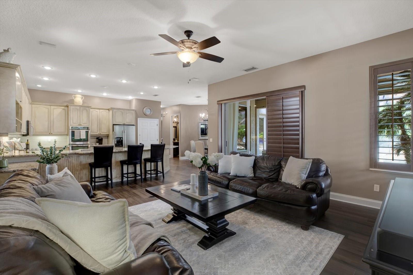 Family Room off the kitchen with breakfast nook leading to pool/lanai.