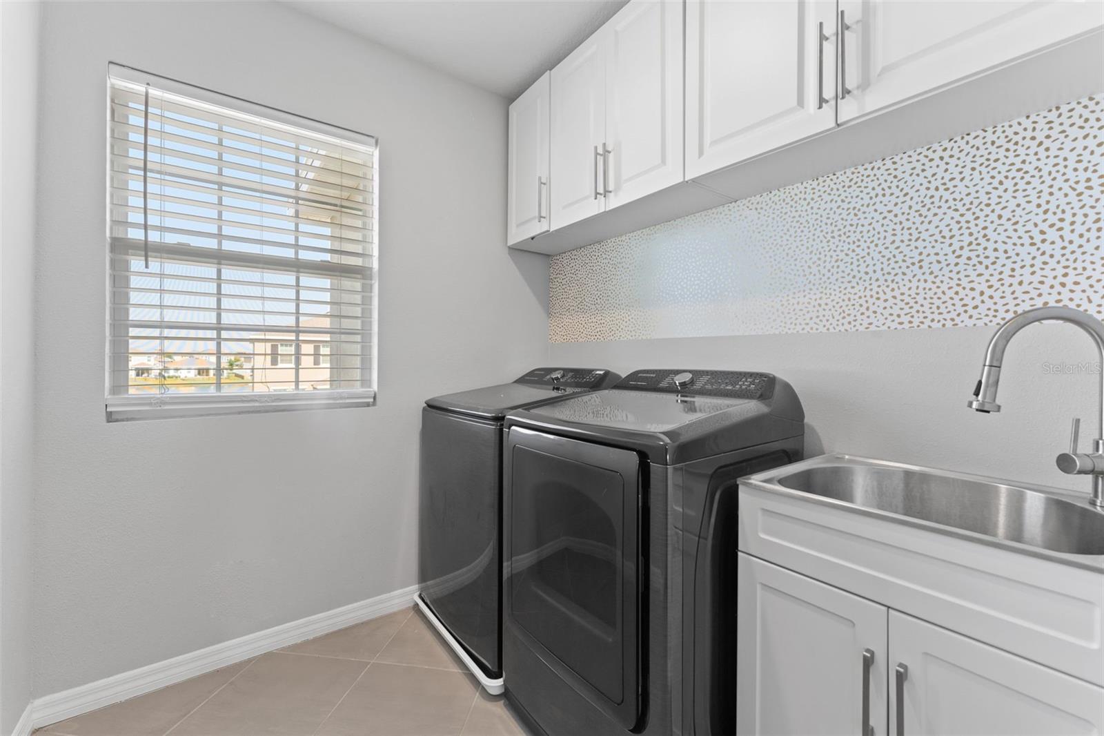 Updstairs dedicated laundry room