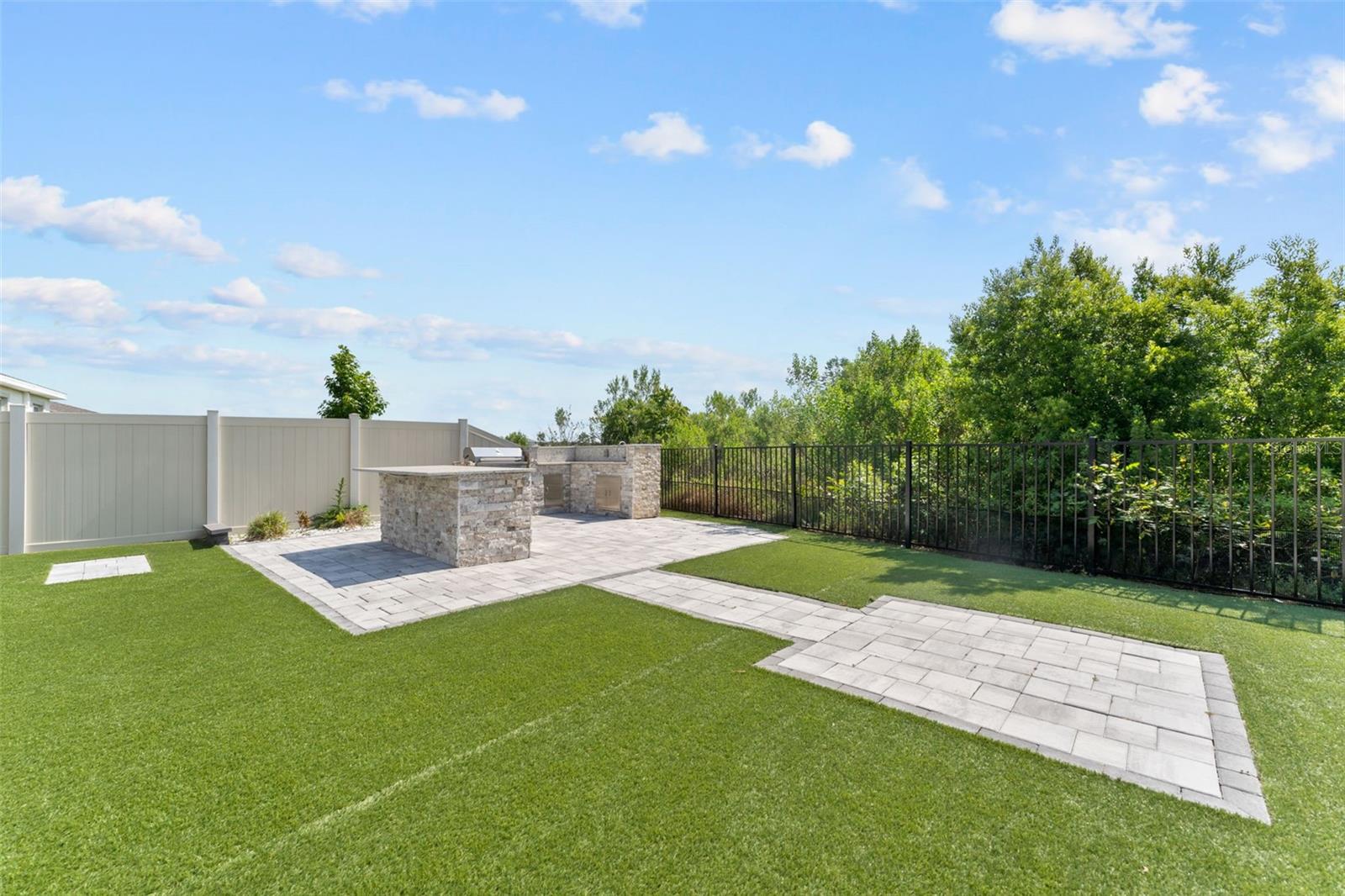 Maintenance free turf & outdoor kitchen