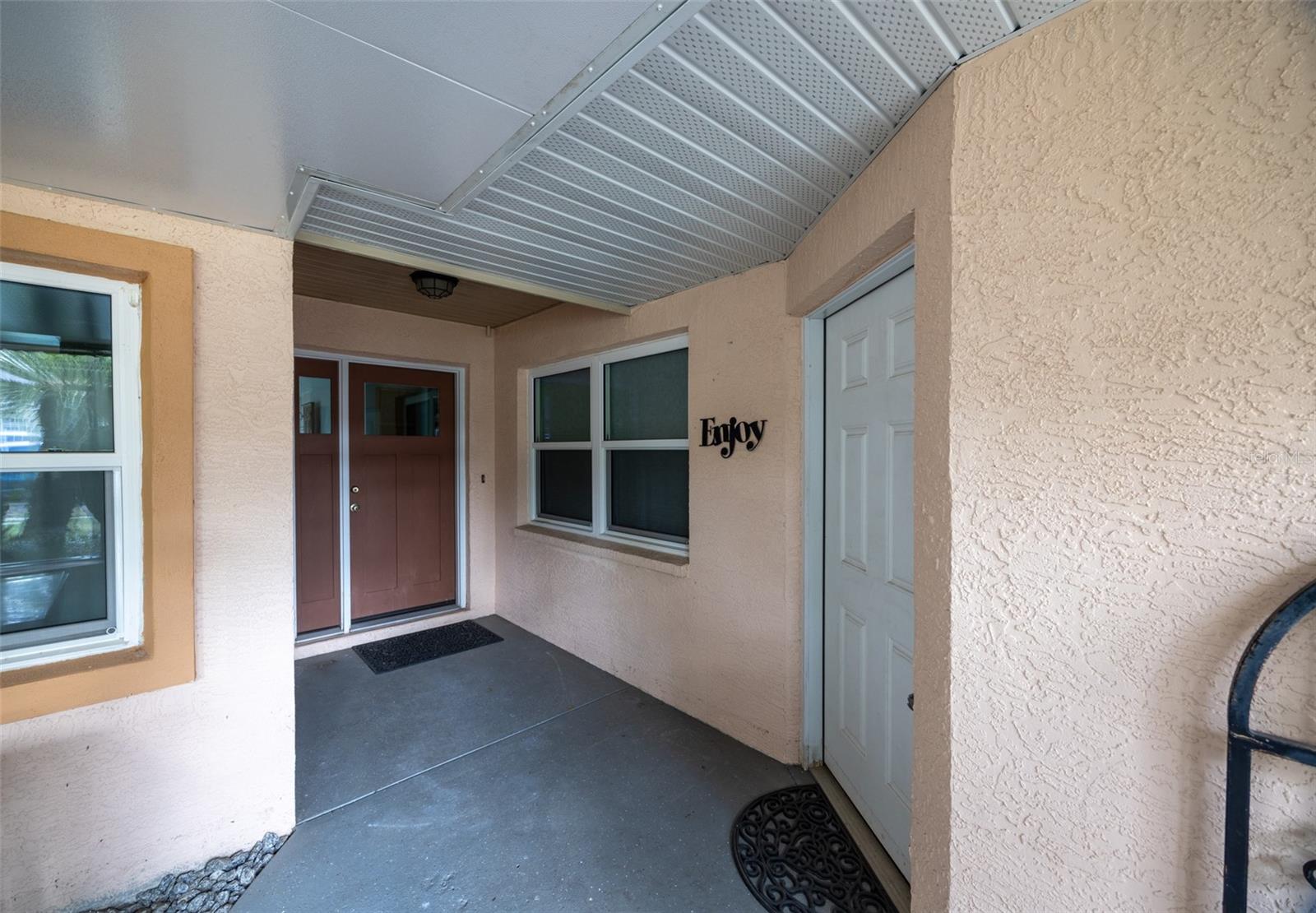 Front Entry is a large screenedfront porch