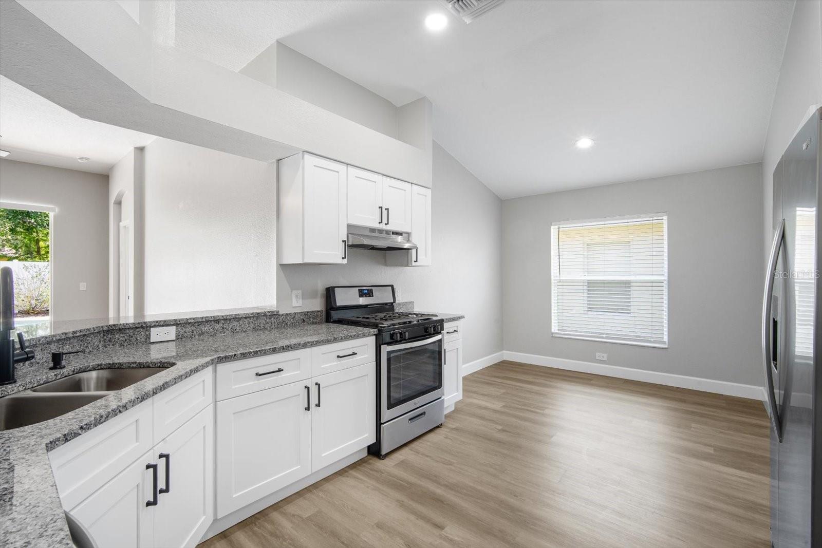 Open Kitchen with sunny Eating Nook