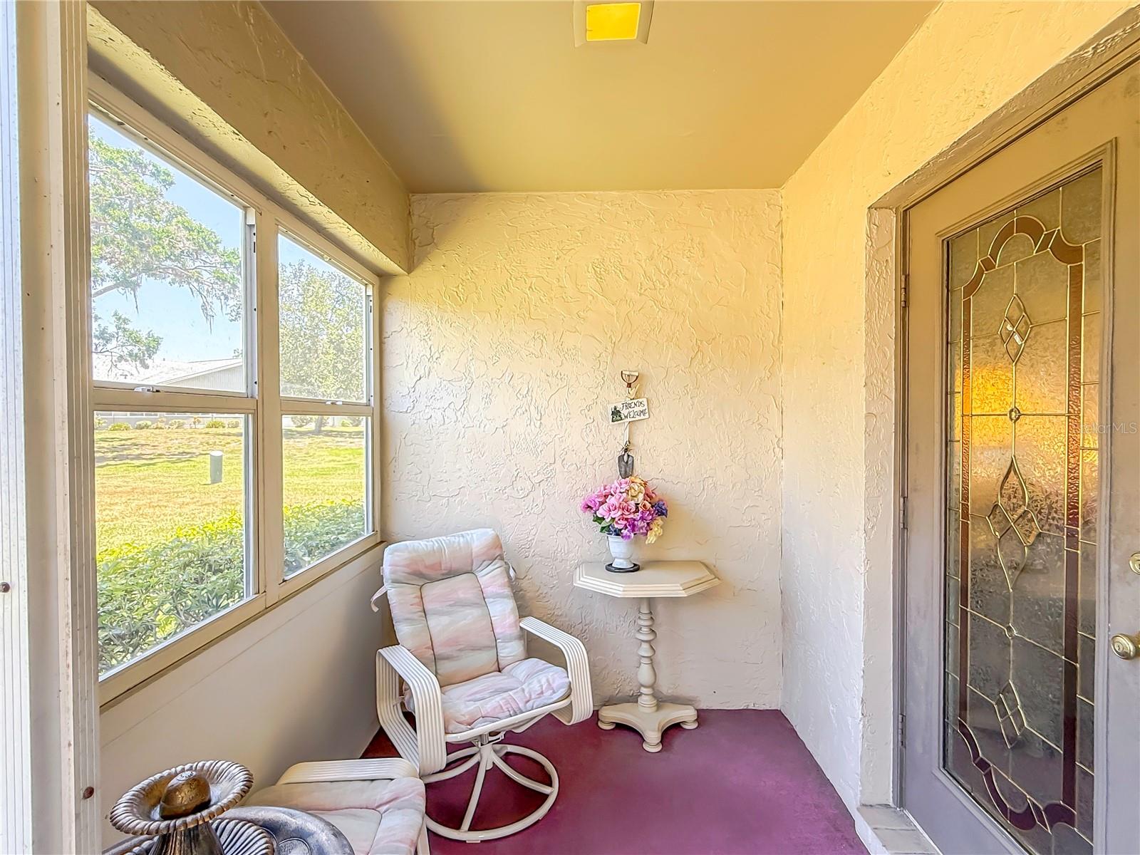 Screened Entry way/Front Door.