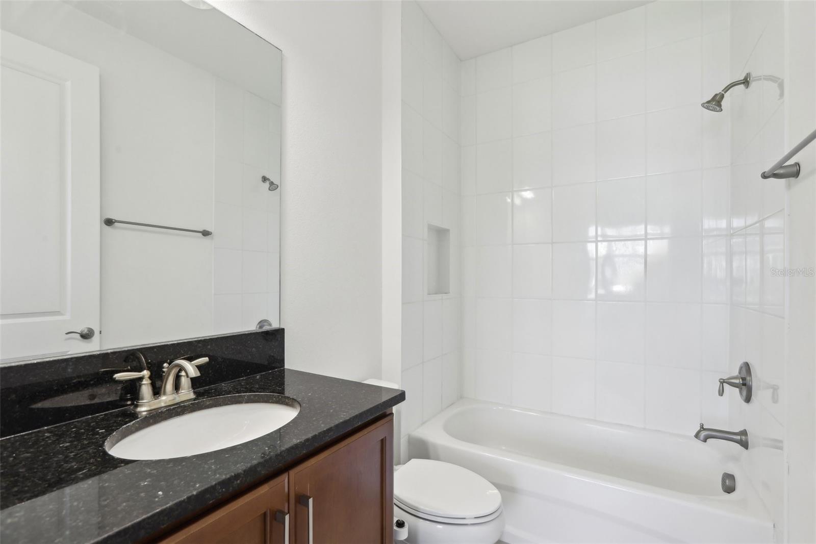 Full Ensuite bath Downstairs