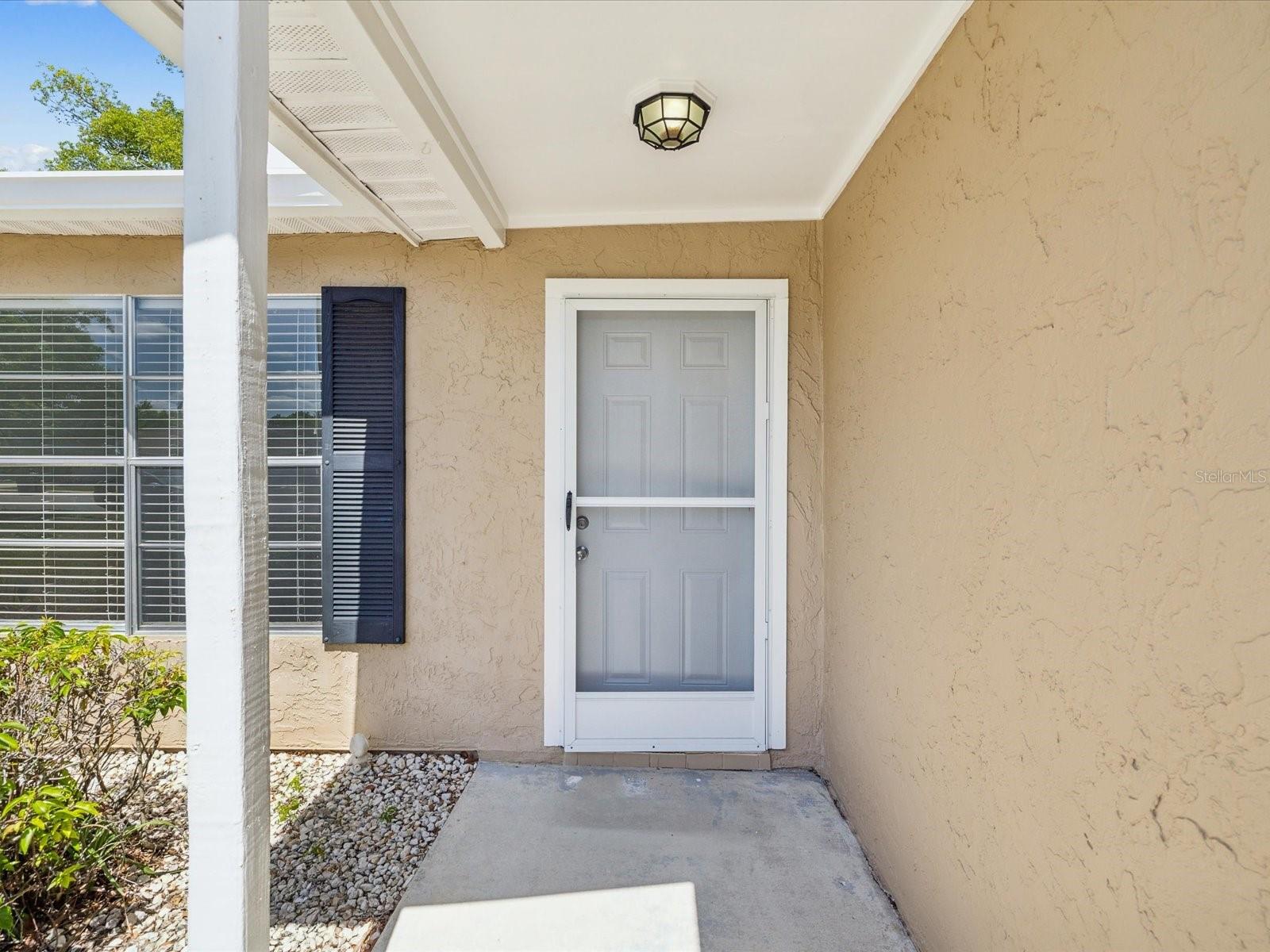 Covered walk was and screen door