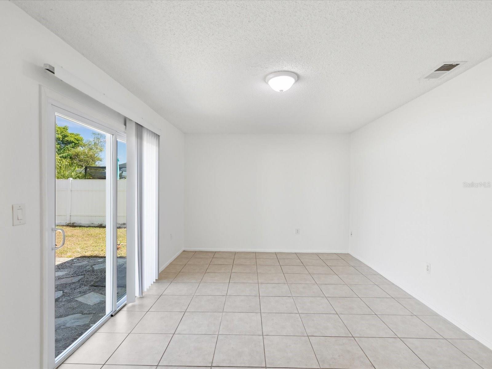 Kitchen opens to a bonus/family room