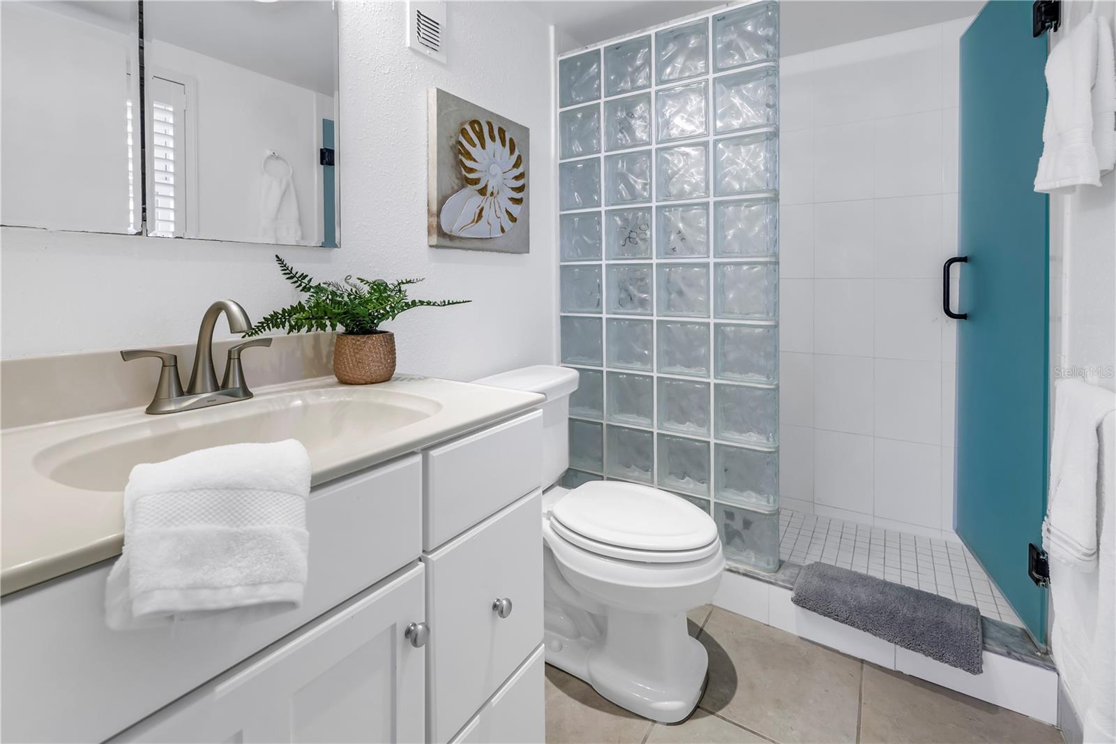 Walk-in shower in the main bedroom