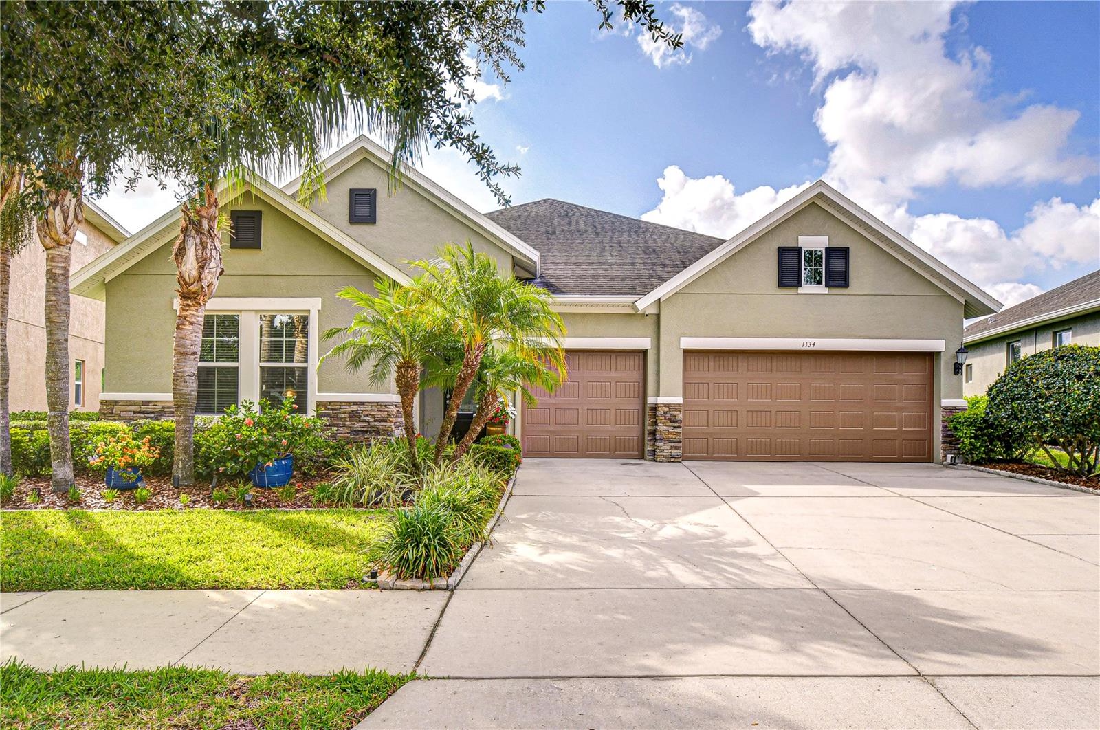 Welcome to this beautifully maintained home located in the gated Hunters Lake neighborhood!