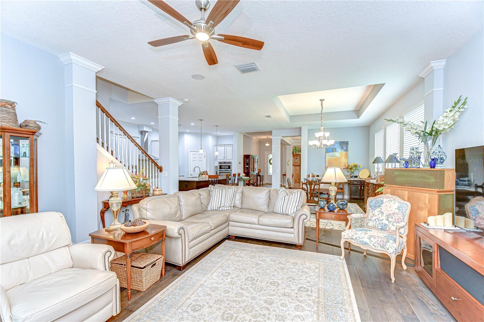 Neutral paint, wood flooring, and crown molding... Yes please!