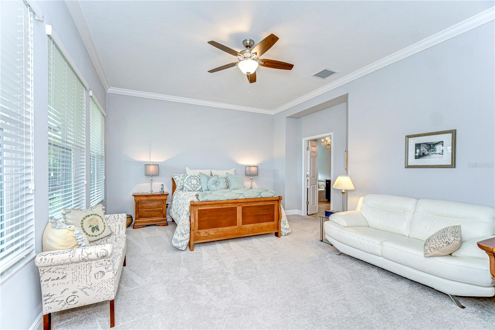 This primary suite boasts natural lighting and tons of place to unwind!