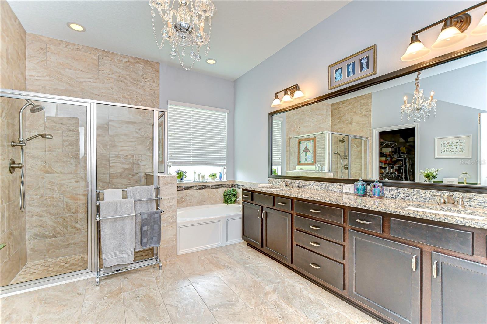 Primary en-suite includes dual sinks, walk-in shower, and seperate tub!