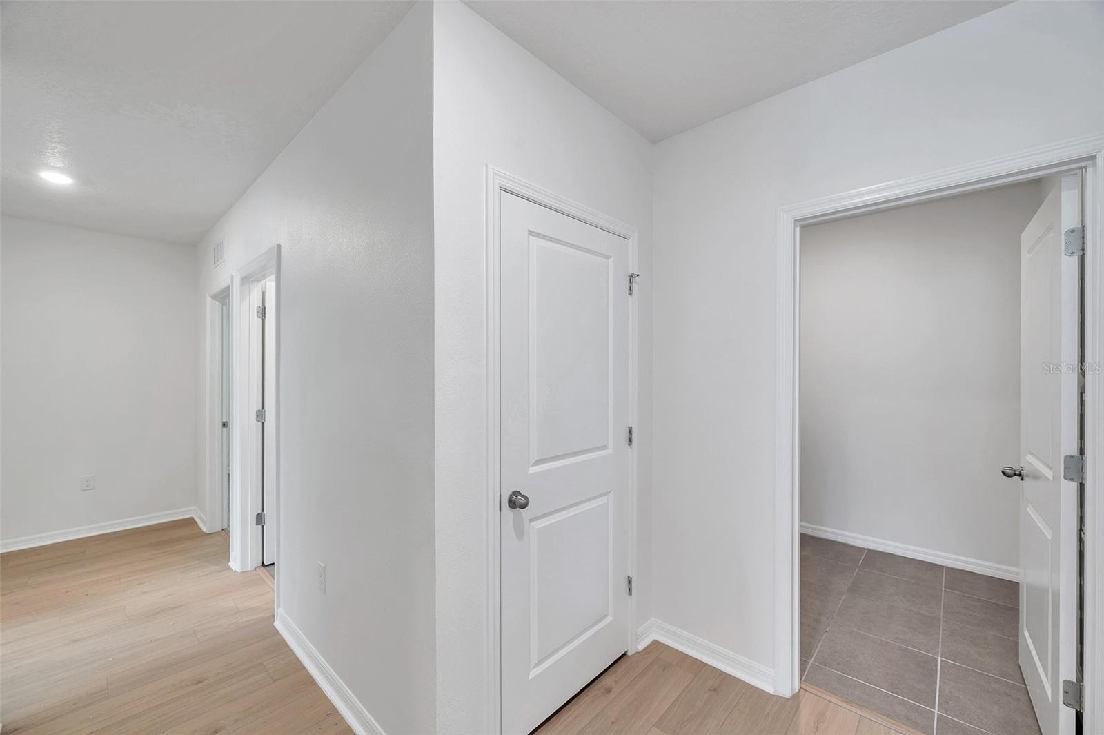Upstairs hallway and laundry room door