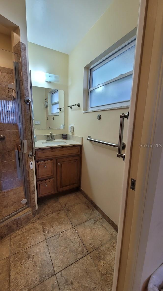 This shower bathroom was updated in the past 7 years and includes some grab bars that were very helpful for the previous owners.