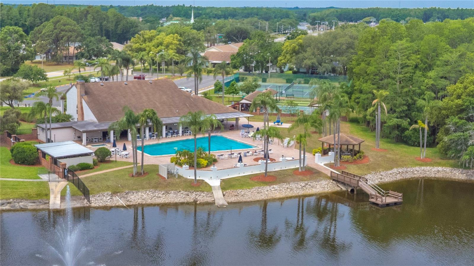 Community pool has a pond view and observation dock.