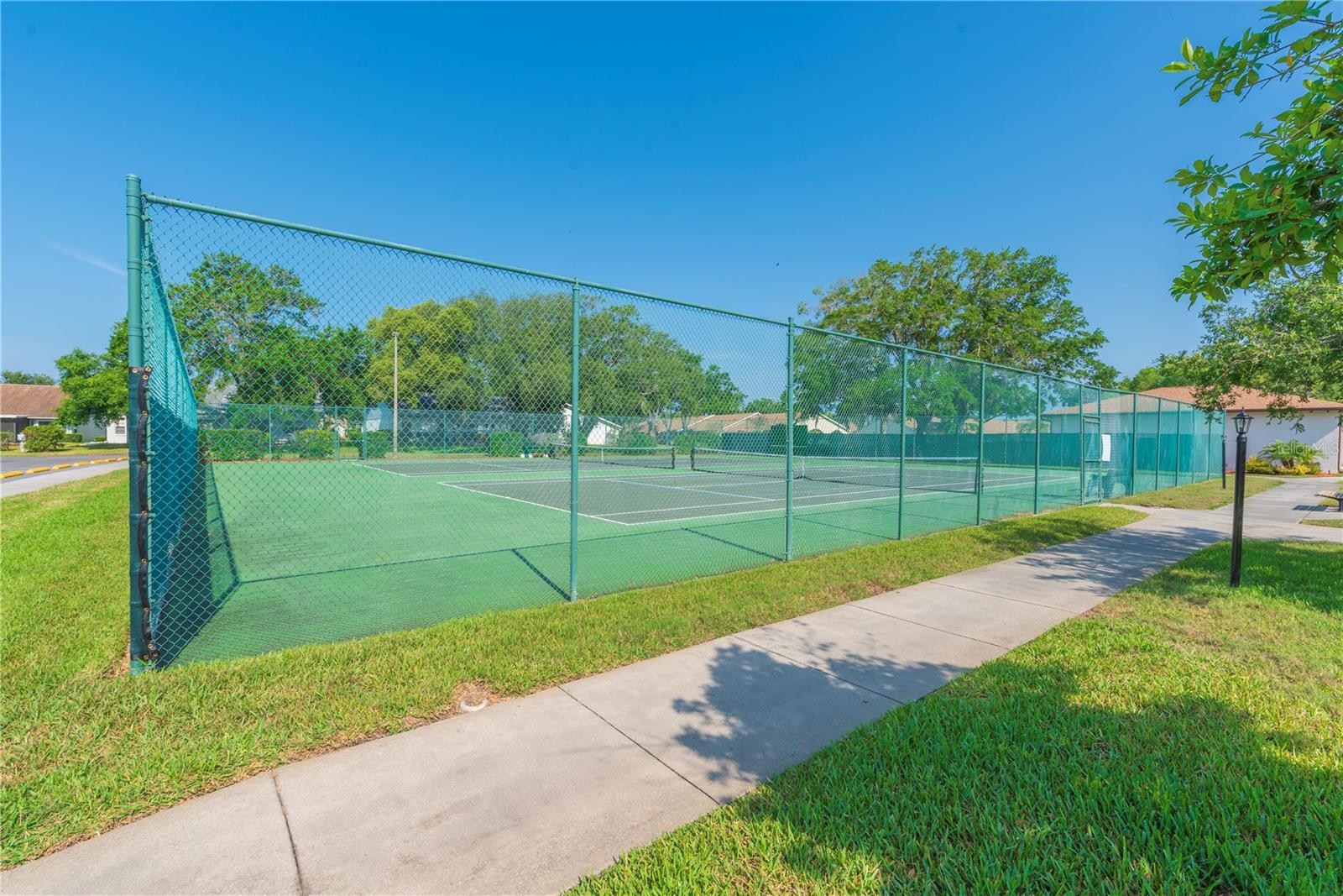 Community tennis and pickleball courts.