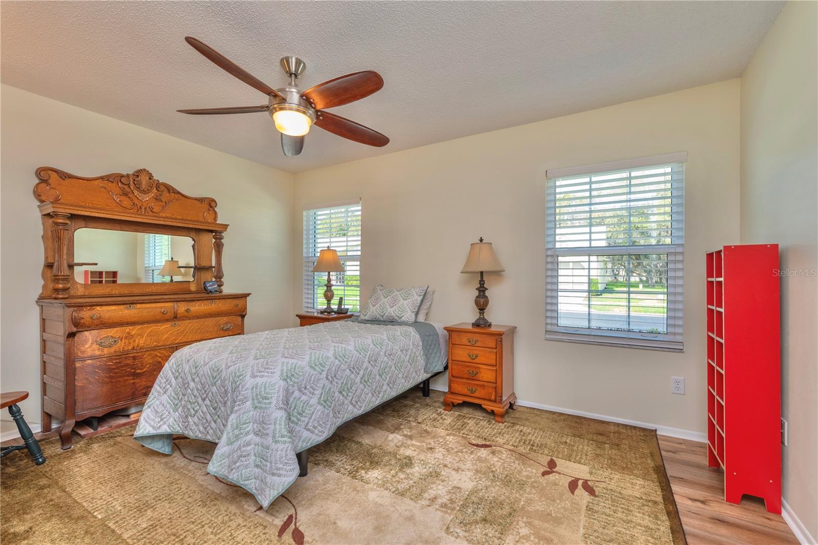 Primary bedroom has dual walk-in closets.