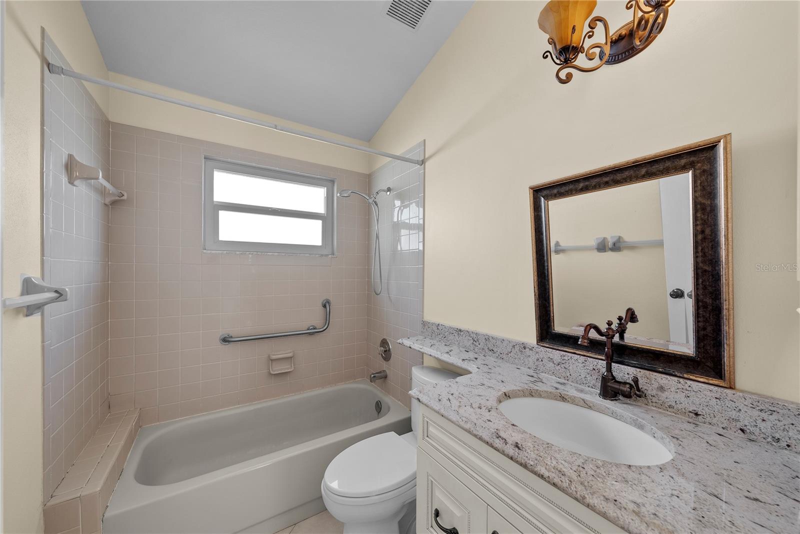 Hall bath between bedrooms 2 & 3.