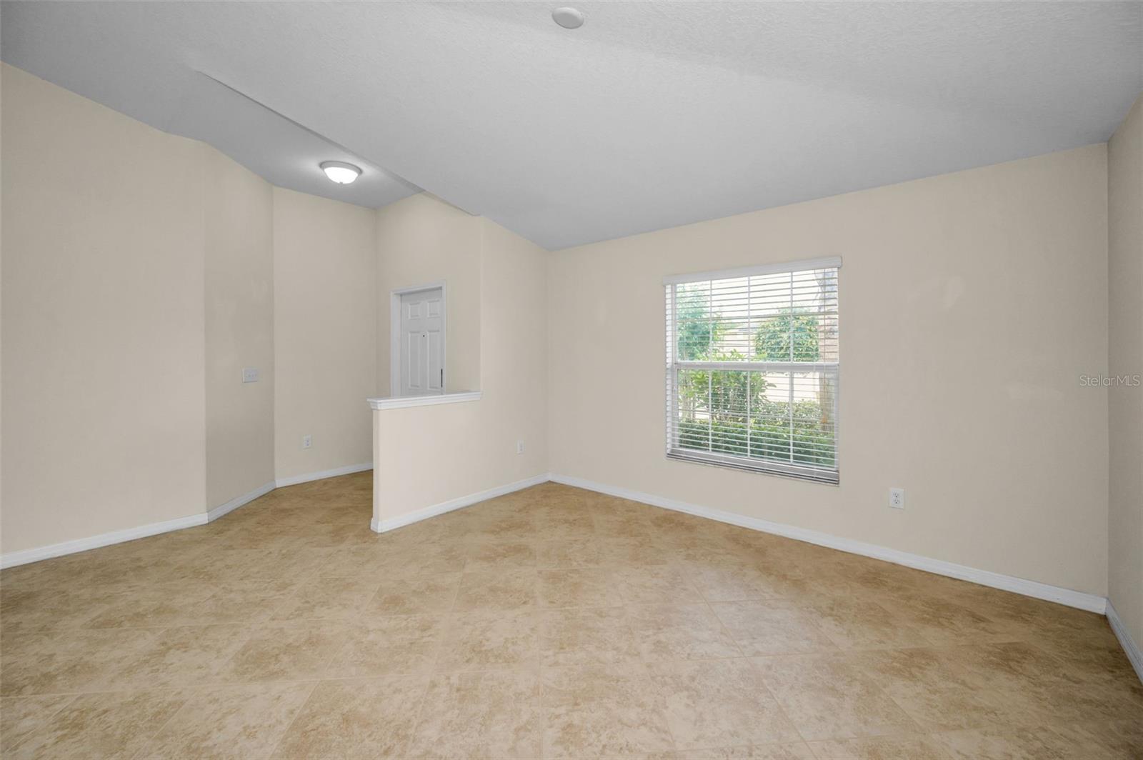 Entrance foyer which opens to livingroom/diningroom combo