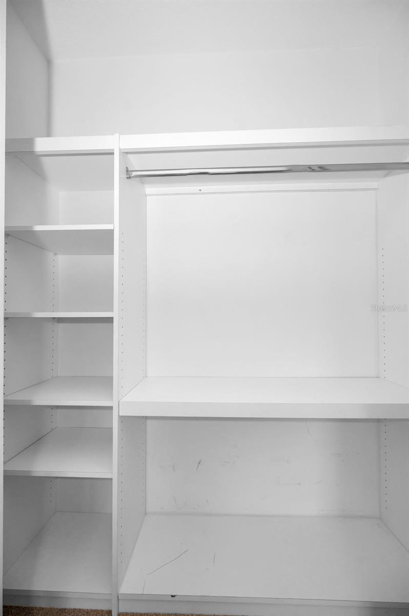 Custom closet organizer in 3rd bedroom