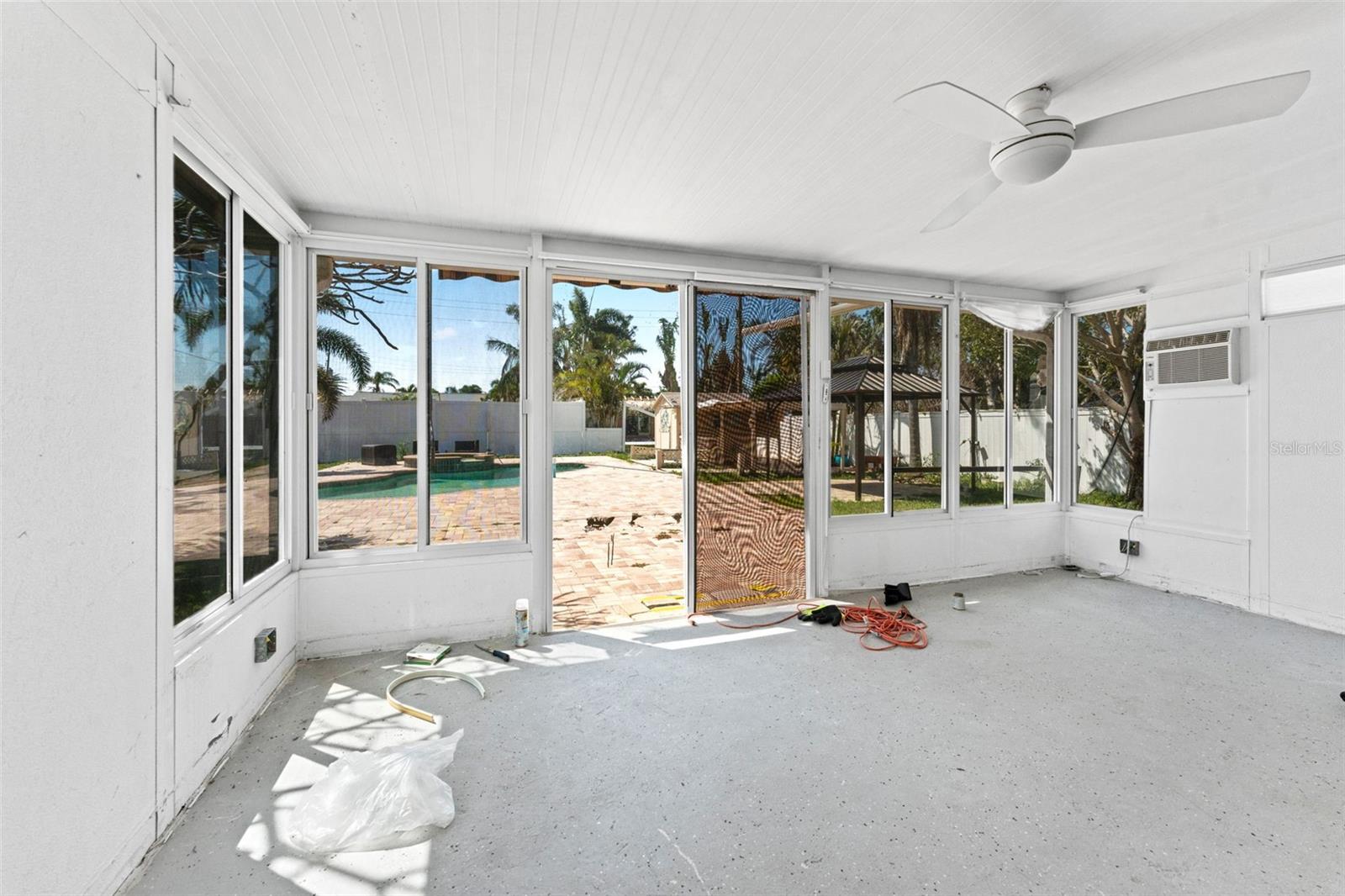 There is a large Florida room that open to the back yard.