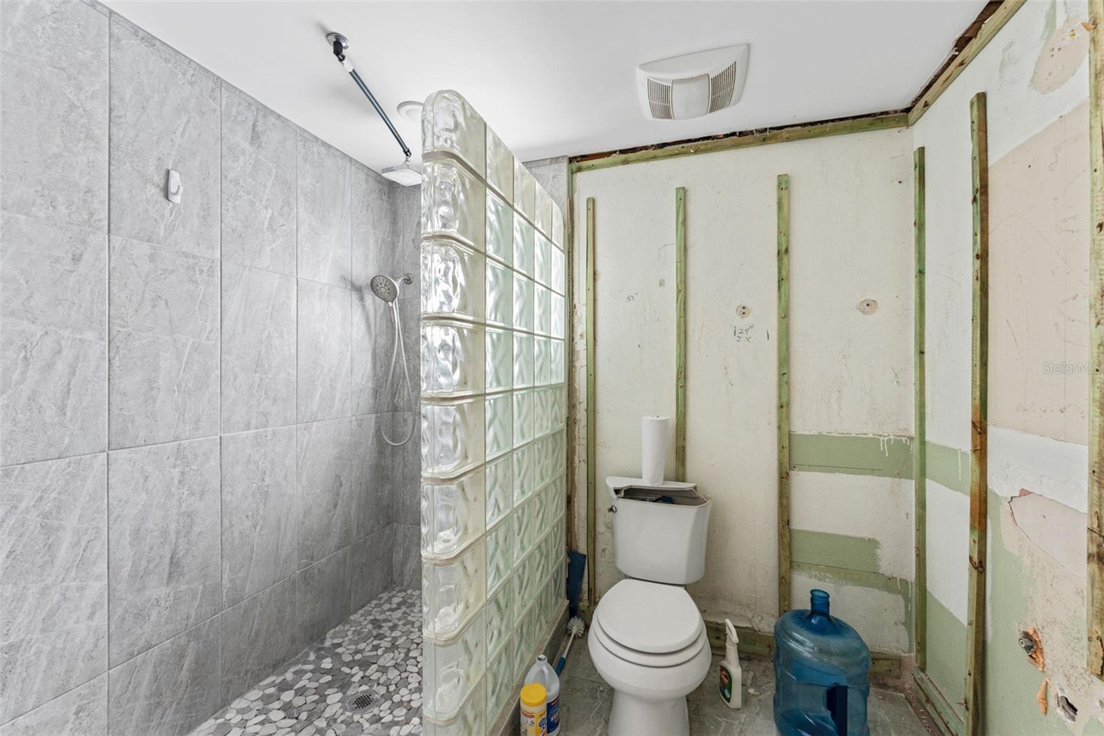 Bath attached to the den, the laundry area is also located near this bath.