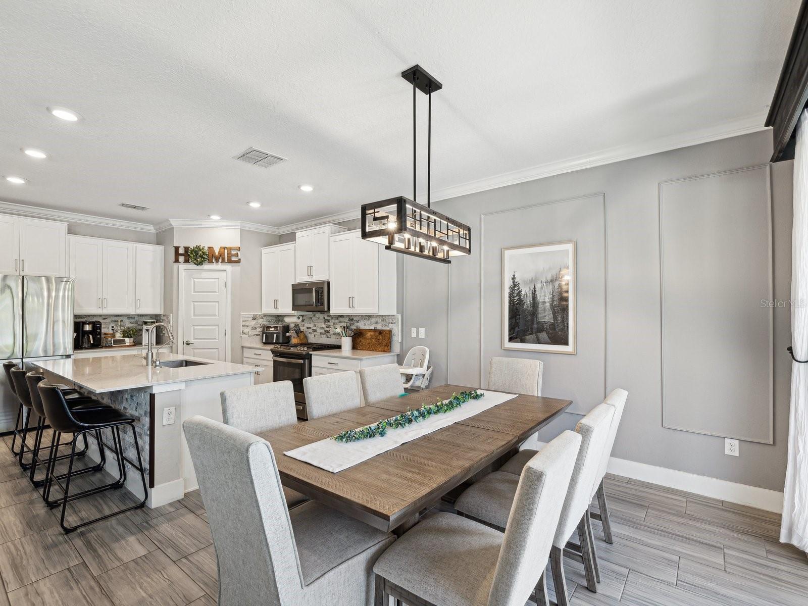 Large Dining area with custom accent wall