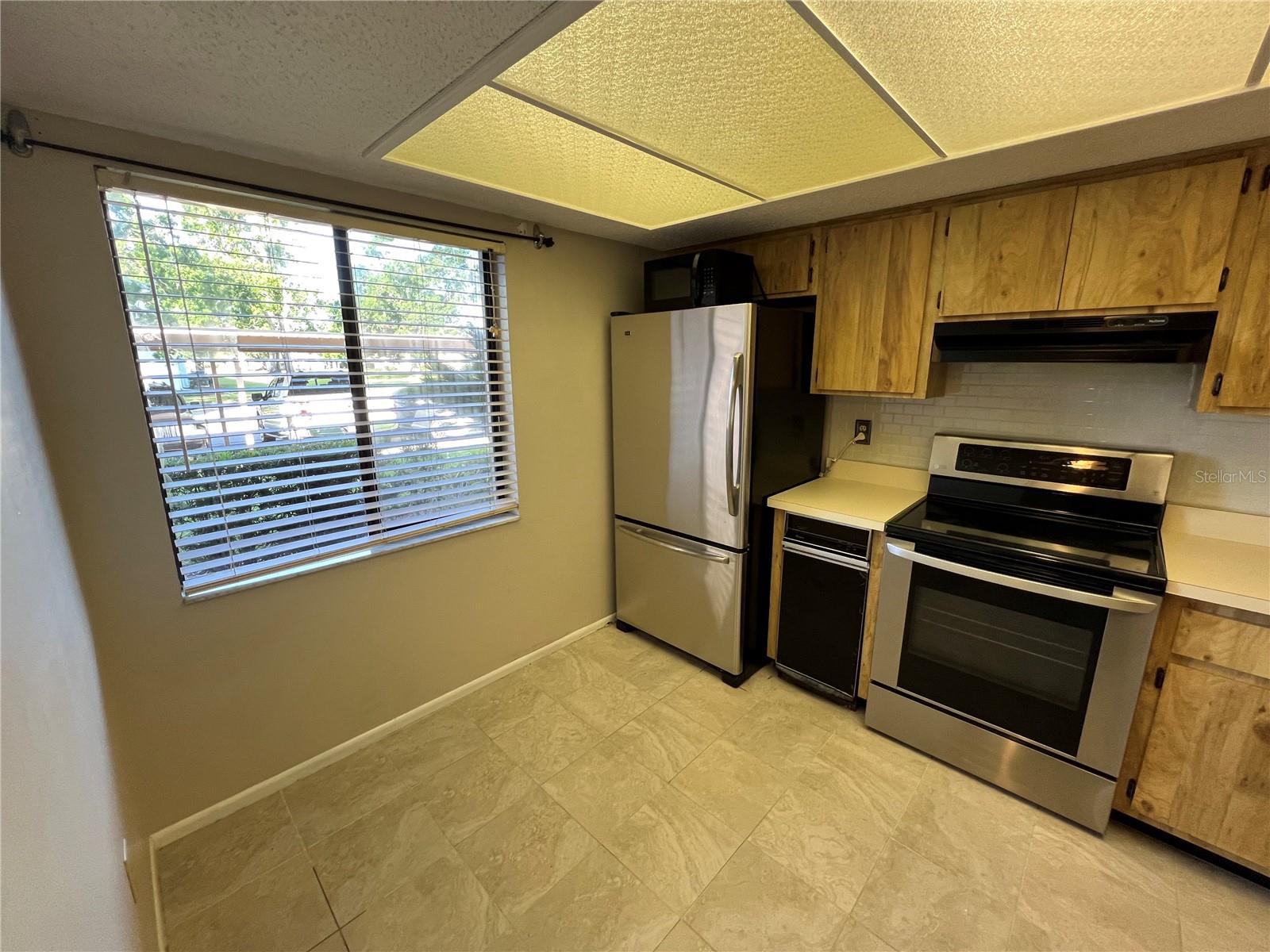 Spacious kitchen with room for a cagfe table and chairs