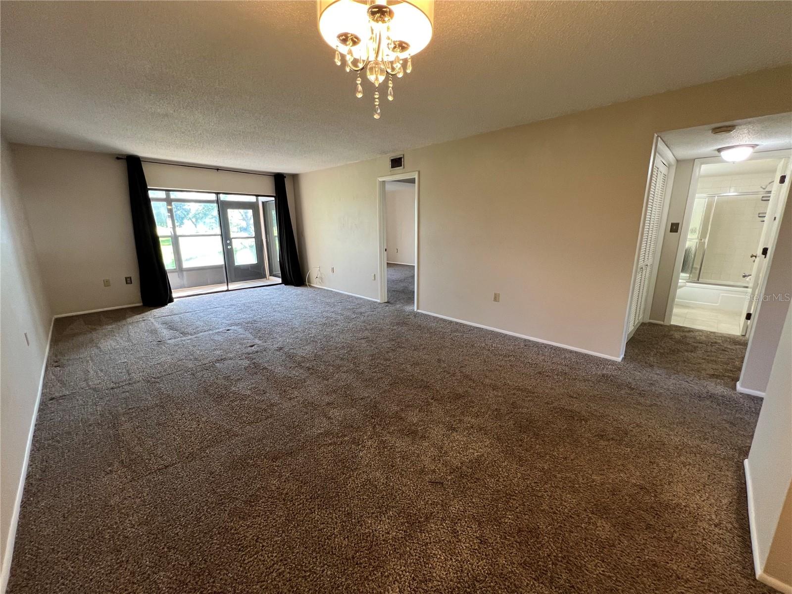 Large living and dining room off the kitchen