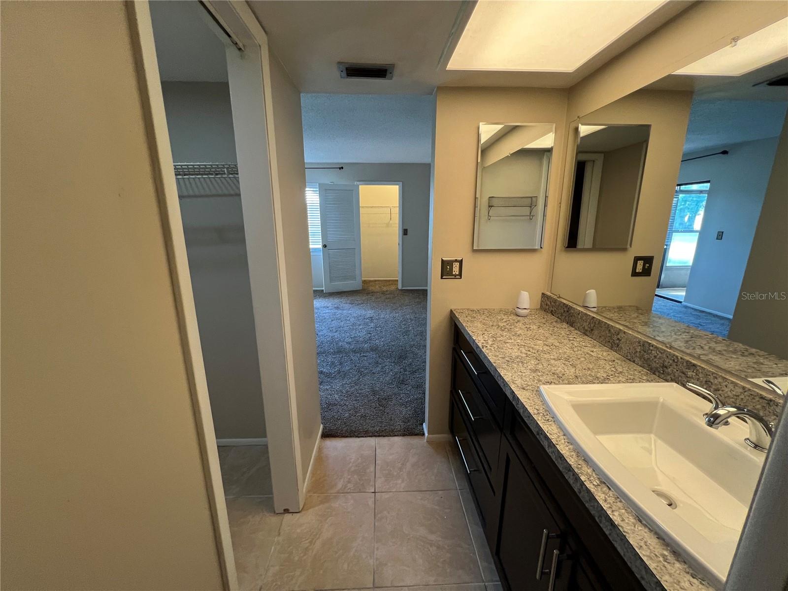 master bath with large closet