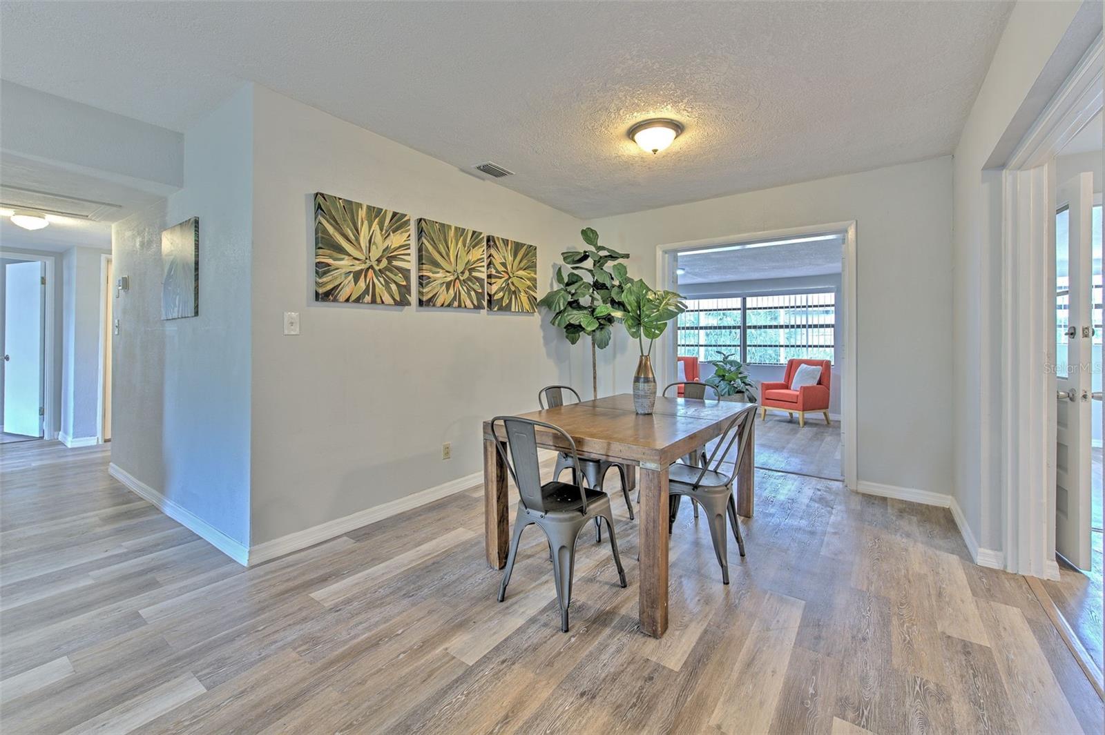 3 bedrooms along the left hallway, master suite is behind dining room
