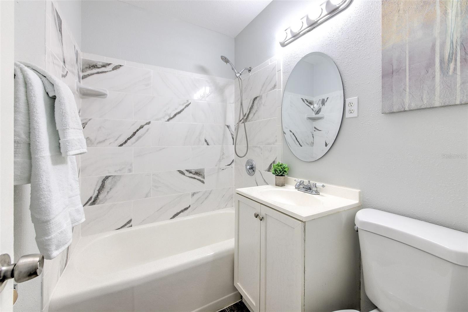 guest bathroom with updated tile